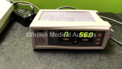 Mixed Lot Including 1 x Vitalograph Syringe Driver, 1 x Vitalograph 2130 Base Station with 1 x Vitalograph 2120 Spirometer and 1 x AC Power Supply (Base Station Powers Up, Spirometer No Power) 1 x My Care Link Unit and 1 x Nellcor N-560 Pulse Oximeter (Po - 4