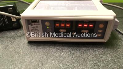 Mixed Lot Including 1 x Vitalograph Syringe Driver, 1 x Vitalograph 2130 Base Station with 1 x Vitalograph 2120 Spirometer and 1 x AC Power Supply (Base Station Powers Up, Spirometer No Power) 1 x My Care Link Unit and 1 x Nellcor N-560 Pulse Oximeter (Po - 7