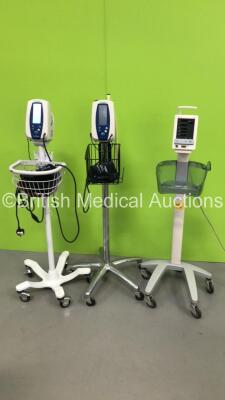 2 x Welch Allyn SPOT Vital Signs Monitors on Stands with BP Hoses and Cuffs (Both Power Up) and 1 x Datascope Duo Patient Monitor on Stand (No Power) *S/N MD03240-D6*