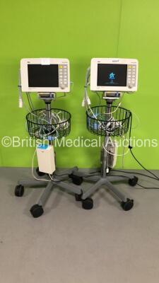 2 x Drager Infinity Delta Patient Monitors with HemoMed 1,Aux/Hemo 3,NBP AND MultiMed Options on Stands with Assorted Leads (1 x Powers Up,1 x No Power-2 x Damage To Plastic Grille/Trim-See Photos)