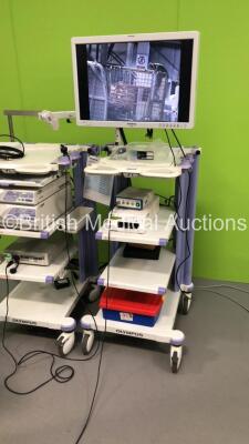 2 x Olympus Stack Trolleys Including Olympus OEV261H Monitor,Olympus Evis Lucera CV-260SL Digital Processor,Olympus Evis Lucera MAJ-1154 Pigtail Connector,Olympus Evis Lucera CLV-260SL Light Source/Processor Unit,Olympus OES OTV-S6 Camera Control Unit,Oly - 11