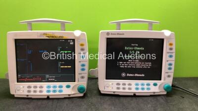 2 x Datex Ohmeda S/5 FM Type F-FMW-00 Patient Monitors with 2 x GE Type E-PSM-00 Modules Including ECG, NIBP, T1-T2, SpO2 Options (Both Power Up)