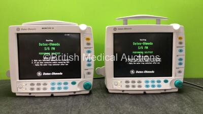 2 x Datex Ohmeda S/5 FM Type F-FMW-00 Patient Monitors with 2 x GE Type E-PSM-00 Modules Including ECG, NIBP, T1-T2, SpO2 Options (Both Power Up)