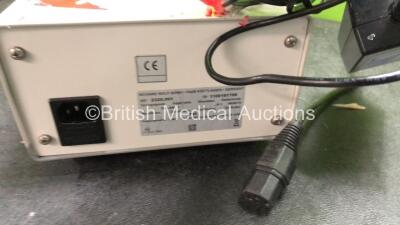 Mixed Lot Including 1 x Mckinley T345 Syringe Pump (Powers Up) 1 x KCI IVAC Pump with 1 x AC Power Supply in Carry Case (No Power with Cracked Screen-See Photo) 1 x Fisher & Paykel MR850AEK Respiratory Humidifier Unit (Powers Up) 1 x Richard Wolf 2320 Tel - 10