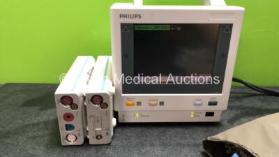 Philips M3046A Patient Monitor with 1 x Philips M3000A Opt C06 Module Including ECG/Resp, SpO2, NBP, Temp and Press Options, 1 x Agilent M3015A Microstream CO2 Module, 2 x BP Hoses, 2 x BP Cuffs, 1 x SpO2 Lead and 1 x 3 Lead ECG Trunk Lead (Powers Up with - 2