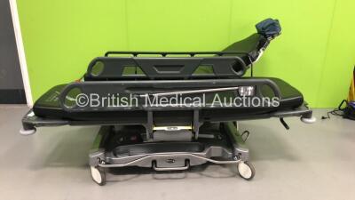 1 x Stryker Transport Patient Trolley with Mattress (Hydraulics Tested Working) and 1 x Anetic Aid QA3 Patient Trolley (Hydraulics Tested Working) *S/N HUD0086 / FS0136123*