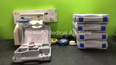 Mixed Lot Including 1 x Eschmann VP25 Portable Suction Unit with 1 x Cup (No Power) 2 x Footswitches, 1 x Ethicon ILS Curved Intra Stapler, 9 x Accu Chek Performa Blood Glucose Meters (All Power Up)