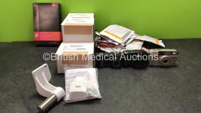 Mixed Lot Including 1 x Medi Open Toe Clima Sock, 5 x PDM Dovetail Mount Bracket Kits, 1 x Ricoh Caplio GX Camera, 1 x Canon PC1256 Camera, 1 x Minolta Riva Zoom 90 Camera and 10 x Physio Control Adult Defibrillation Pads *All Out of Date*