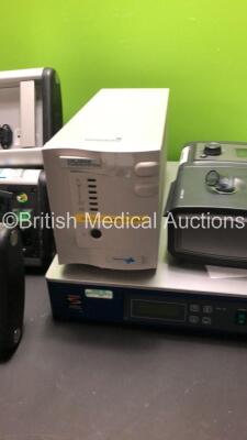 4 x Carefusion Alaris DS Charging Stations, 1 x Chloride Power Protection UPS, 1 x Table Stable TS-150, Baxter Spare Parts and Philips Respironics REMStar Pro C-Flex + CPAP *S/N P11141767FBC9 / H166300366F0D / 023929* - 3