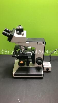 Leitz Laborlux S Benchtop Microscope with 2 x 10x/18 Eyepieces and 5 x Optics (160 /- NPL FLUOTAR 50/1.00 OIL / 160/0.17 NPL FLUOTAR 40/0.70 / 160/- PLAN 4/0.10 / *160/0.17 PL FLUOTAR 100/1.32 OIL and *160/- PL FLUOTAR 10/0.30) *S/N 096259* - 6