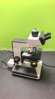 Leitz Laborlux S Benchtop Microscope with 2 x 10x/18 Eyepieces and 5 x Optics (160 /- NPL FLUOTAR 50/1.00 OIL / 160/0.17 NPL FLUOTAR 40/0.70 / 160/- PLAN 4/0.10 / *160/0.17 PL FLUOTAR 100/1.32 OIL and *160/- PL FLUOTAR 10/0.30) *S/N 096259* - 9