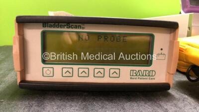 Mixed Lot Including 1 x Bard BVI 2500 Bladder Scanner (Powers Up with Missing Probe and Missing Power Supply) 1 x Nonin Medical Model 2500 Pulse Oximeter (Untested Due to Missing Batteries) 1 x Mindray TMS 6016 Telemetry Monitoring System (Powers Up) 1 x - 2