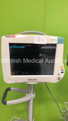 2 x Philips IntelliVue MP50 Neonatal Patient Monitors on Stands with 2 x M3001A Modules with Press/Temp,NBP,SpO2 and ECG/Resp * Mfd 2005 / 2013 * 4 x Temp Modules and Job Lot of Leads (Both Power Up) * Mfd 2012 / 2012 * - 2