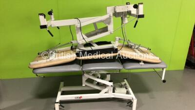 1 x Plinth Co Electric 3-Way Patient Examination Couch with Controller and 1 x Medi-Plinth 3-Way Electric Patient Examination Couch with Controller (Both Power Up) * Asset No FS 0002247 / FS 0096950 *