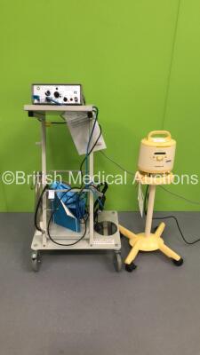 Mixed Lot Including 1 x Medela Symphony Breast Pump on Stand and 1 x Helica Instruments TC Helium Thermal Coagulator on Stand with Footswitch (Both Power Up) * SN TC 536 *