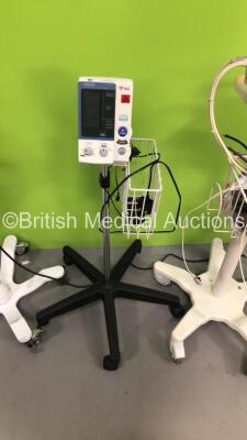 1 x Welch Allyn 53N00 Vital Signs Monitor on Stand with BP Hose (Powers Up) 1 x Omron Digital Blood Pressure Monitor on Stand (No Power) and 1 x Philips SureSigns VM4 Vital Signs Monitor on Stand with SPO2 Finger Sensor, 3 Lead ECG Leads, BP Hose and Cuf - 3