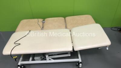 1 x Huntleigh Akron Electric Patient Examination Couch with Controller and 1 x Huntleigh Akron 3-Way Electric Patient Examination Couch with Controller (Both Power Up)