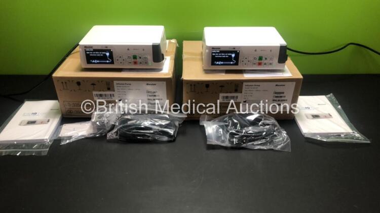 2 x Baxter EvoIQ LVP Infusion Pumps with Operators Manual * Mfd 2018* (Power Up in Excellent Condition - Boxed) *SK80807717 - SK80803282*