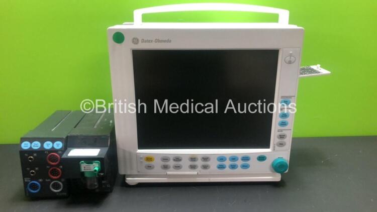 GE Datex-Ohmeda F-CM1-05 Patient Monitor *Mfd 2009* (No Power) with 1 x Datex-Engstrom M-CO-00-00 Gas Module with Water Trap and 1 x Datex-Ohmeda M-ESTPR..04 Module