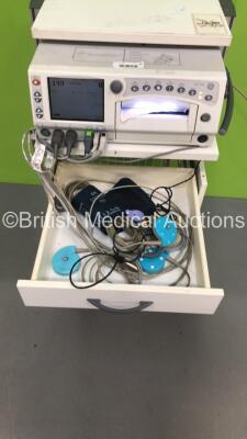 GE 250cx Series Fetal Monitor on Stand with 1 x SpO2 Finger Sensor,3 x US Transducers,1 x ECG Lead and 1 x BP Hose and Cuff (Powers Up)