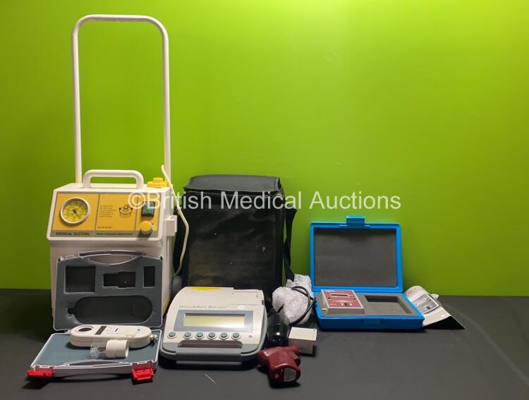 Mixed Lot Including 1 x BladderScan BVI 3000 Bladder Scanner with Transducer/ Probe and 2 x Flat Batteries in Case, 1 x Ohmeda XCaliber Transducer Calibration System, 1 x EZ-IO G3 Power Driver, 1 x SAM 12 High Vacuum-High Flow Medical Suction Unit and 1 x