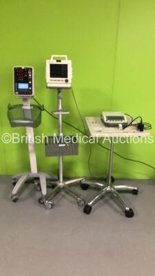 Mixed Lot Including 1 x Mindray Datascope Accutorr V Patient Monitor on Stand,1 x Nellcor N5600 Patient Monitor with ECG,SpO2,T1,T2 and NBP Options (Both Power Up) and 1 x Verathon BVI 3000 Bladder Scanner with 1 x Probe on Stand (No Power)