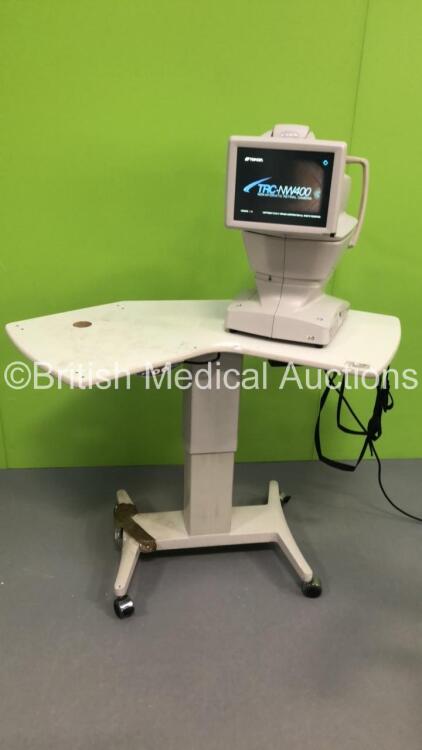 TopCon TRC-NW400 Non-Mydriatic Retinal Camera Version 1.10 on Motorized Table (Powers Up) *S/N 981003 **Mfd 06/2016** *FOR EXPORT OUT OF THE UK ONLY*