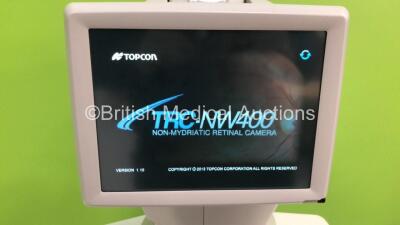 TopCon TRC-NW400 Non-Mydriatic Retinal Camera Version 1.10 on Motorized Table (Powers Up) *S/N 981003 **Mfd 06/2016** *FOR EXPORT OUT OF THE UK ONLY* - 2