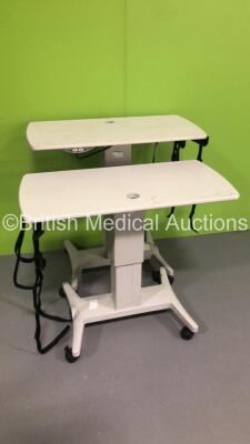 4 x TopCon Electric Ophthalmic Tables (1 x Missing Wheel - 2 x Damaged - See Pictures) *S/N 20060007604763 / 201100272310191 / 201100273097888) - 2