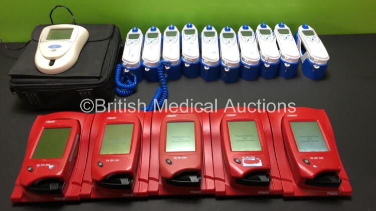 Mixed Lot Including 5 x HemoCue Hb 201 DM Blood Analysers with Docking Stations (All Power Up) 10 x Covidien Genius 3 Tympanic Thermometers and 1 x Roche CoaguChek S Coagulation Meter with Power Supply and Case (Powers Up) 1302621083 - 1302621081 - 130262