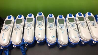 Mixed Lot Including 5 x HemoCue Hb 201 DM Blood Analysers with Docking Stations (All Power Up) 10 x Covidien Genius 3 Tympanic Thermometers and 1 x Roche CoaguChek S Coagulation Meter with Power Supply and Case (Powers Up) 1302621083 - 1302621081 - 130262 - 3