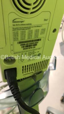 4 x Mindray Datascope Duo Patient Monitors on Stands with 4 x BP Hoses and 4 x SpO2 Finger Sensors (All Power Up) * SN MD13951-K0 / MD15097-K1 / MD07581-C8 / MD07576-C8 * - 6