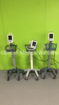 3 x Mindray Datascope Duo Patient Monitors on Stands with 3 x BP Hoses (All Power Up-1 x Broken Handle on Stand-1 x Broken Monitor Bracket Mount) * SN MD09372-L8 / MD07572-C8 / MD01288-L4 *