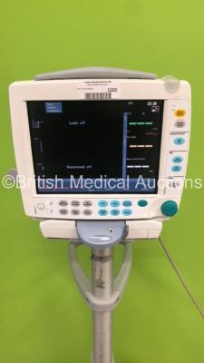 GE S5 F-FM-01 Patient Monitor on Stand with 1 x E-PSMP-00 Module with NIBP,P1/P2,T1/T2,SpO2 and ECG Options * Mfd 2010 * (Powers Up-Crack to Casing-See Photos) * SN 6657879 / 6646197 * * Mfd 2010 * - 4