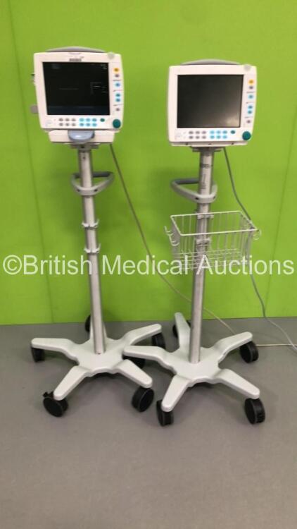 2 x GE S5 F-FM-01 Patient Monitors on Stands with 1 x N-FC-00 Module with Mini D-Fend Water Trap * Mfd 2010 * (1 x Powers Up,1 x No Power) * SN 6660422 / 6882589 * * Mfd 2012 / 2010 *