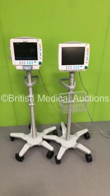 2 x GE S5 F-FM-01 Patient Monitors on Stands with 1 x N-FC-00 Module with Mini D-Fend Water Trap * Mfd 2010 * (1 x Powers Up,1 x No Power) * SN 6660422 / 6882589 * * Mfd 2012 / 2010 * - 2