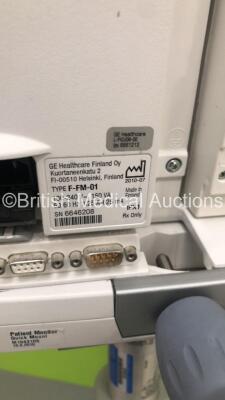 2 x GE S5 F-FM-01 Patient Monitors on Stands with 1 x N-FC-00 Module with Mini D-Fend Water Trap * Mfd 2010 * (1 x Powers Up,1 x No Power) * SN 6660422 / 6882589 * * Mfd 2012 / 2010 * - 7