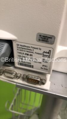 2 x GE S5 F-FM-01 Patient Monitors on Stands with 1 x N-FC-00 Module with Mini D-Fend Water Trap * Mfd 2010 * (1 x Powers Up,1 x No Power) * SN 6660422 / 6882589 * * Mfd 2012 / 2010 * - 8