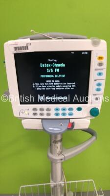 GE S5 F-FM-00 Patient Monitor on Stand with 1 x E-PSMP-00 Module with NIBP,P1/P2,T1/T2,SpO2 and ECG Options * Mfd 2010 - Crack to Casing-See Photos * and 1 x N-FC-00 Module with Mini D-Fend Water Trap * Mfd 2010 * (Powers Up-Damage to Casing-See Photos) * - 2