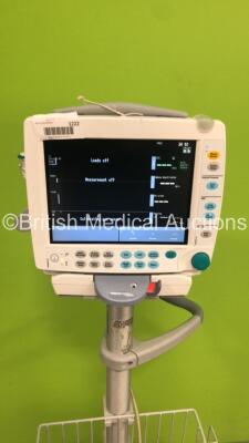 GE S5 F-FM-00 Patient Monitor on Stand with 1 x E-PSMP-00 Module with NIBP,P1/P2,T1/T2,SpO2 and ECG Options * Mfd 2010 - Crack to Casing-See Photos * and 1 x N-FC-00 Module with Mini D-Fend Water Trap * Mfd 2010 * (Powers Up-Damage to Casing-See Photos) * - 3