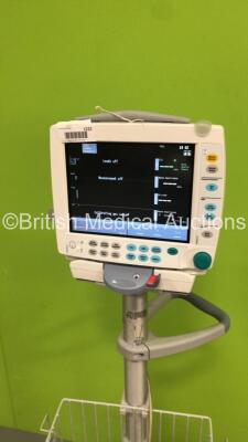 GE S5 F-FM-00 Patient Monitor on Stand with 1 x E-PSMP-00 Module with NIBP,P1/P2,T1/T2,SpO2 and ECG Options * Mfd 2010 - Crack to Casing-See Photos * and 1 x N-FC-00 Module with Mini D-Fend Water Trap * Mfd 2010 * (Powers Up-Damage to Casing-See Photos) * - 5