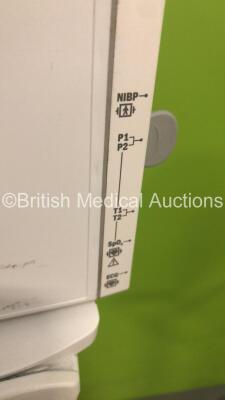 1 x GE S5 F-FM-00 Patient Monitor on Stand with 1 x N-FC-00 Module with Mini D-Fend Water Trap * Mfd 2012 * and 1 x GE S5 F-FM-01 Patient Monitor on Stand with 1 x E-PSMP-00 Module with NIBP,P1/P2.T1/T2,SpO2 and ECG Options * Mfd 2009 * (Both Power Up) * - 8