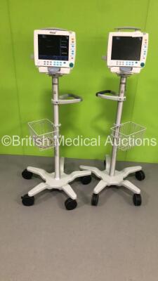 2 x GE S5 F-FM-01 Patient Monitors on Stands with 2 x E-PSMP-01 Modules with NIBP,P1/P2,T1/T2,SpO2 and ECG Options * Mfd 2018 x 2 - Damage to Casing-See Photos * (Both Power Up) * SN 8020860 / 8020846 / 6646209 / 6882596 * * Mfd 2012 / 2010 *