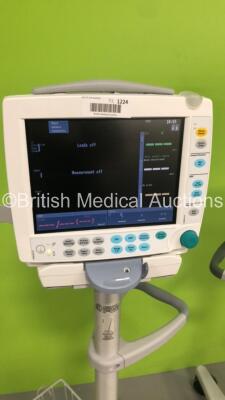 2 x GE S5 F-FM-01 Patient Monitors on Stands with 2 x E-PSMP-01 Modules with NIBP,P1/P2,T1/T2,SpO2 and ECG Options * Mfd 2018 x 2 - Damage to Casing-See Photos * (Both Power Up) * SN 8020860 / 8020846 / 6646209 / 6882596 * * Mfd 2012 / 2010 * - 2