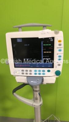 2 x GE S5 F-FM-01 Patient Monitors on Stands with 2 x E-PSMP-01 Modules with NIBP,P1/P2,T1/T2,SpO2 and ECG Options * Mfd 2018 x 2 - Damage to Casing-See Photos * (Both Power Up) * SN 8020860 / 8020846 / 6646209 / 6882596 * * Mfd 2012 / 2010 * - 5