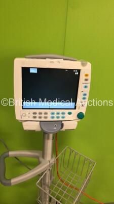 3 x GE S5 F-FM-00 Patient Monitors on Stands (All Power Up-All Chips to Casing-See Photos) * SN 6577677 / 6577659 / 6577666 * * Mfd 2009 / 2009 / 2009 * - 6