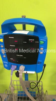 Mixed Lot Including 2 x GE ProCare Auscultatory Patient Monitors on Stands with 2 x BP Hoses,2 x BP Cuffs and 2 x SpO2 Finger Sensors,1 x GE ProCare 300 Patient Monitor on Stand with 1 x BP Hose,1 x BP Cuff and 1 x SpO2 Finger Sensor and 1 x Anetic Aid AP - 4