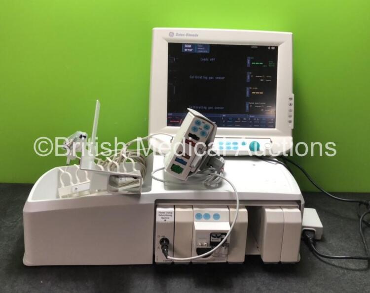 Datex-Ohmeda Anaesthesia Monitoring System Including Monitor with Controller and Power Supply, Module Rack with E-CAiOV Gas Module with Spirometry Option and D-fend Water Trap *Mfd - 08/2010*, E-INTPSM Module with Pole Mount and E-PSMP Multiparameter Modu