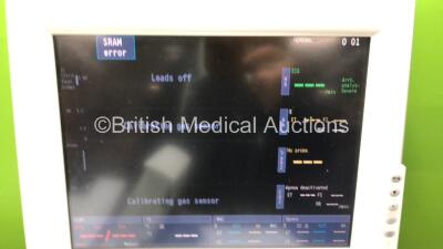 Datex-Ohmeda Anaesthesia Monitoring System Including Monitor with Controller and Power Supply, Module Rack with E-CAiOV Gas Module with Spirometry Option and D-fend Water Trap *Mfd - 08/2010*, E-INTPSM Module with Pole Mount and E-PSMP Multiparameter Modu - 2