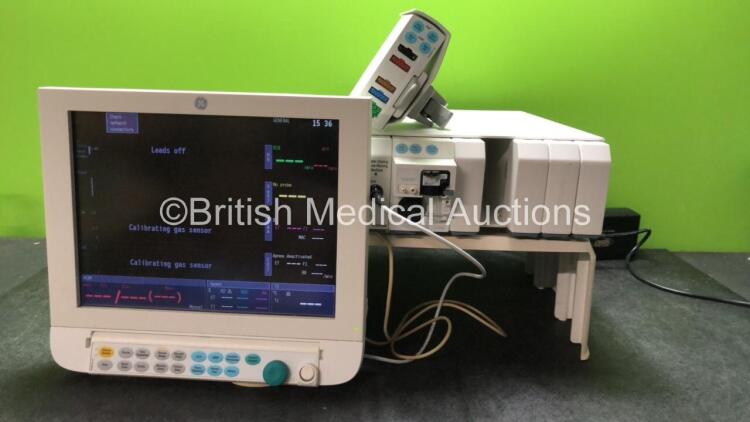 Datex-Ohmeda Anaesthesia Monitoring System Including Monitor with Controller and Power Supply, Module Rack with E-CAiOV Gas Module with Spirometry Option and D-fend Water Trap *09/2010*, E-INTPSM Module with Pole Mount and E-PSMP Multiparameter Module wit